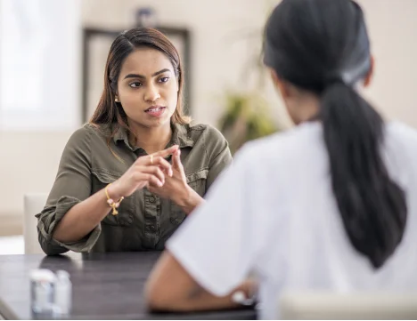 A person speaks to a group