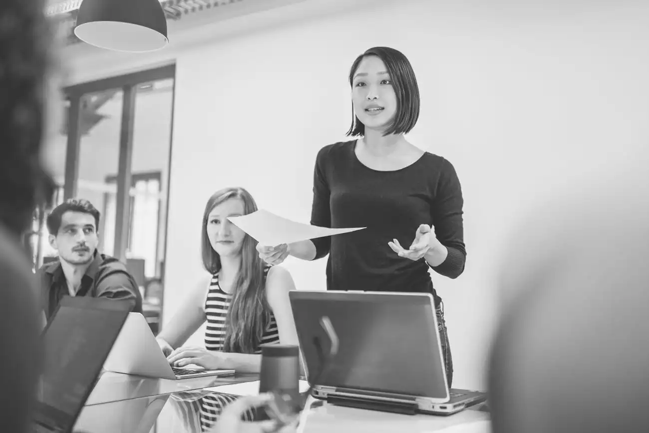 A person speaks to a group